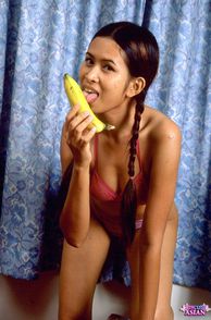 Teasing Asian Licking A Banana