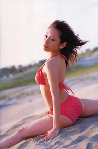 Asia Honey In Bikini Doing Splits At The Beach